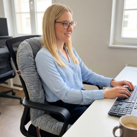 Grey heated cushion in a home office